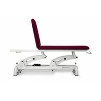 Elektrische Untersuchungsliege: zwei Körper, mit zwei Motoren zur Höhen- und Rückenlehnenverstellung, Rollenhalter, Gesichtskappe und einziehbaren Rädern