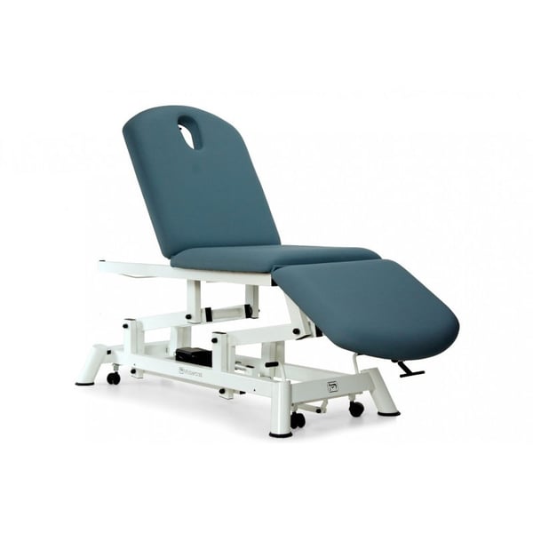 Hydraulische Untersuchungstrage: drei Körper, Stuhltyp, mit Rollenhalter, Gesichtskappe und einziehbaren Rädern