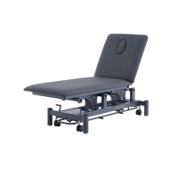 Elektrischer Liegetisch ENID Coinfycare: Zweiteilig, professionell, robust und einfach in Kliniken und Physiotherapiezentren zu verwenden Elektrischer Liegetisch ENID Coinfycare: Zweiteilig, professionell, robust und einfach in Kliniken und Physiotherapiezentren zu verwenden
