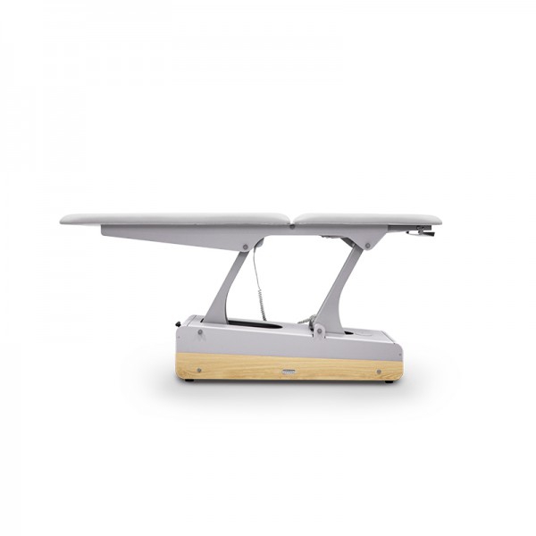 Elektrische Massageliege SWOP 2L SOFT Starter: zweiteilig, multidisziplinär, nahtlose und weichere Polsterung, höhenverstellbarer Motor und einziehbare Räder Elektrische Massageliege SWOP 2L SOFT Starter: zweiteilig, multidisziplinär, nahtlose und weichere Polsterung, höhenverstellbarer Motor und einziehbare Räder